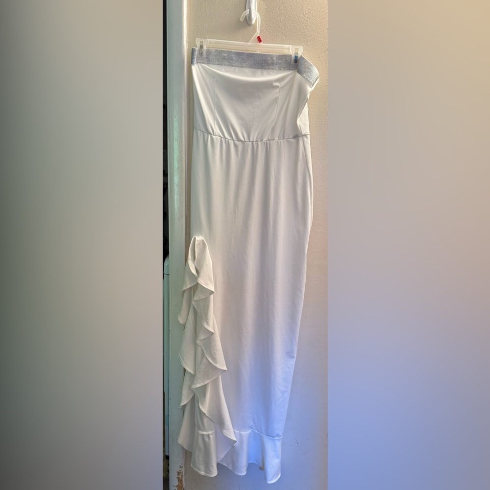 Beautiful white strapless dress with silver going around the top